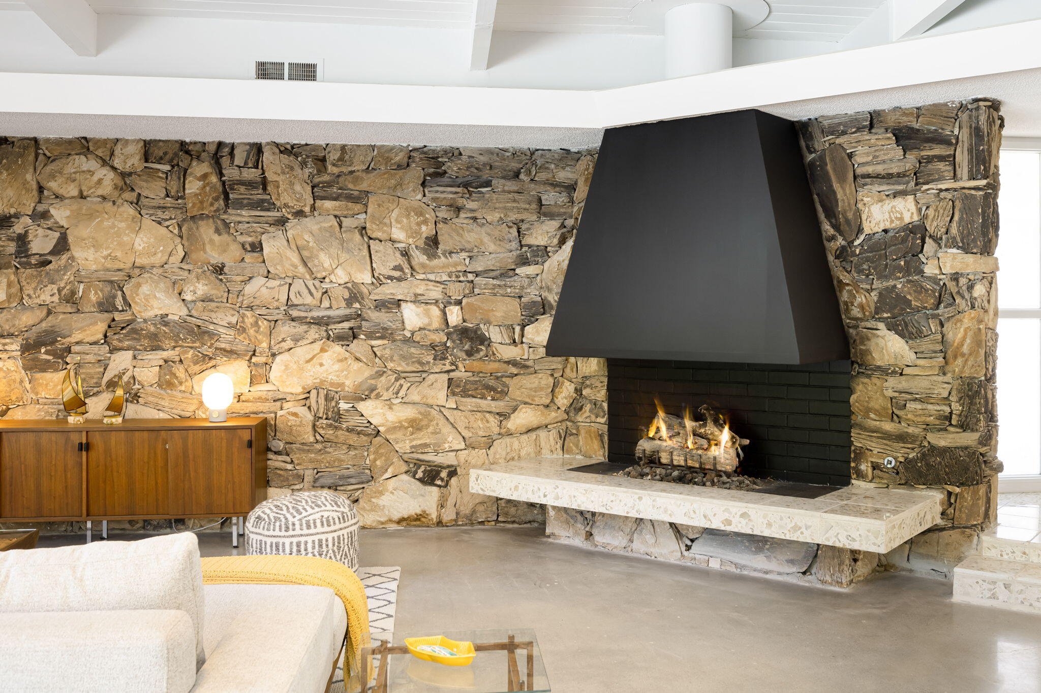 1333 East Deepwell Road Palm Springs, CA 92264 - Photo 9 of 44 a living room with a couch and a fireplace