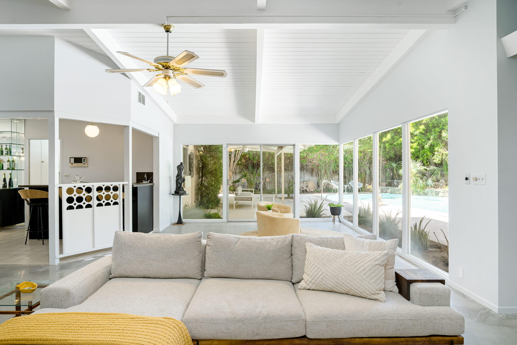 1333 East Deepwell Road Palm Springs, CA 92264 - Photo 10 of 44 a living room with furniture and a large window