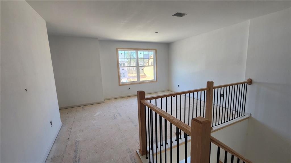 85 Silverleaf Trail Bethlehem, GA 30620 - Photo 12 of 36 an empty room with windows