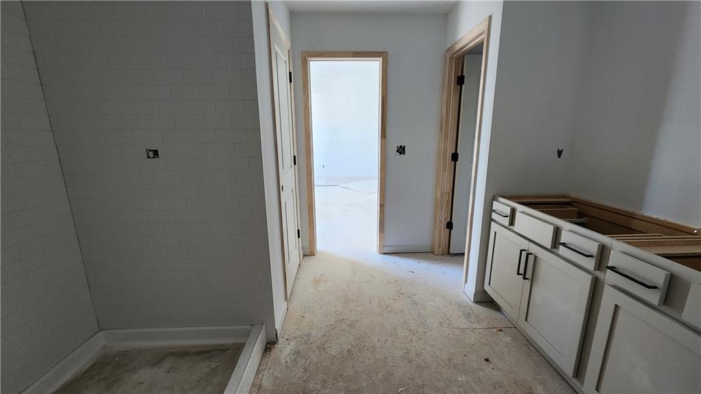 85 Silverleaf Trail Bethlehem, GA 30620 - Photo 20 of 36 a view of a kitchen from the hallway