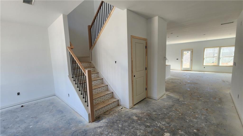 85 Silverleaf Trail Bethlehem, GA 30620 - Photo 2 of 36 a view of a hallway with staircase