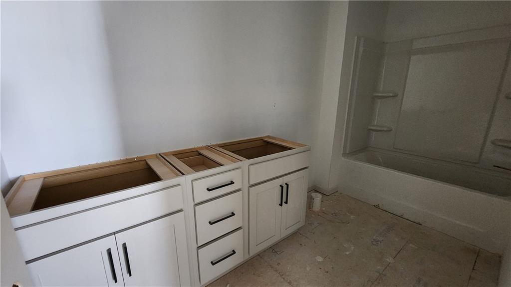 85 Silverleaf Trail Bethlehem, GA 30620 - Photo 26 of 36 a utility room with dryer and washer