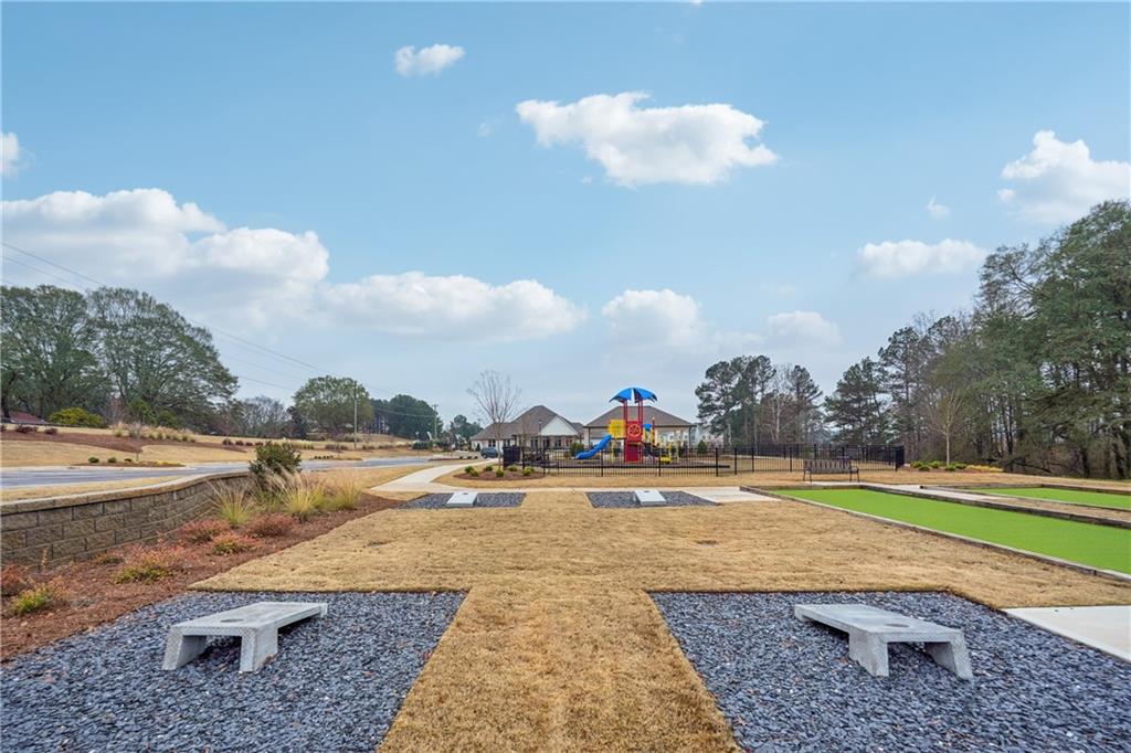 85 Silverleaf Trail Bethlehem, GA 30620 - Photo 8 of 36 a view of a swimming pool with an ocean view