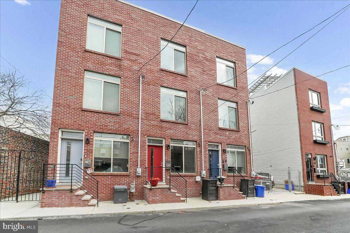 2615 East Letterly Street Philadelphia, PA 19125 - Photo 2 of 36 a view of a building with a street
