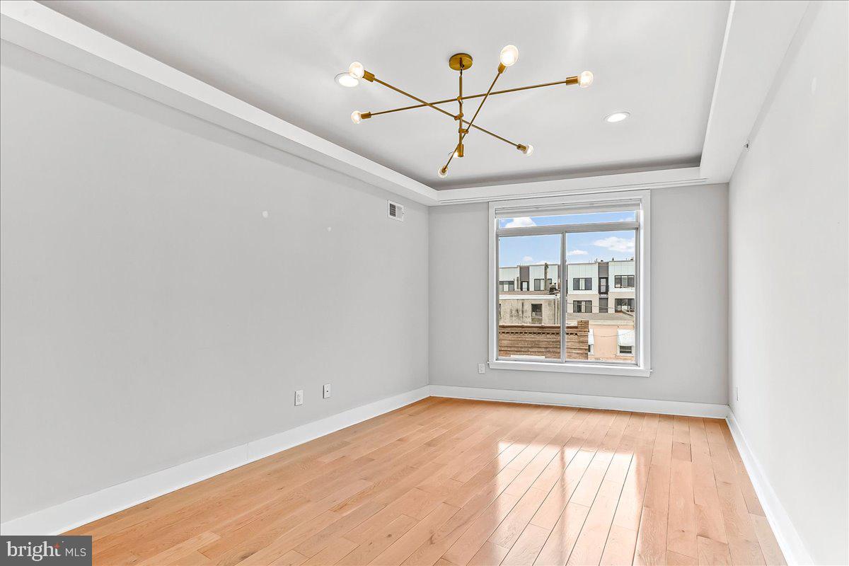 2615 East Letterly Street Philadelphia, PA 19125 - Photo 21 of 36 a view of an empty room with a window
