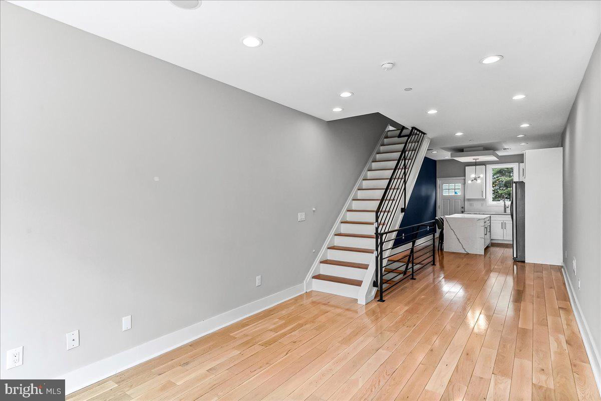 2615 East Letterly Street Philadelphia, PA 19125 - Photo 3 of 36 a view of an empty room with wooden floor