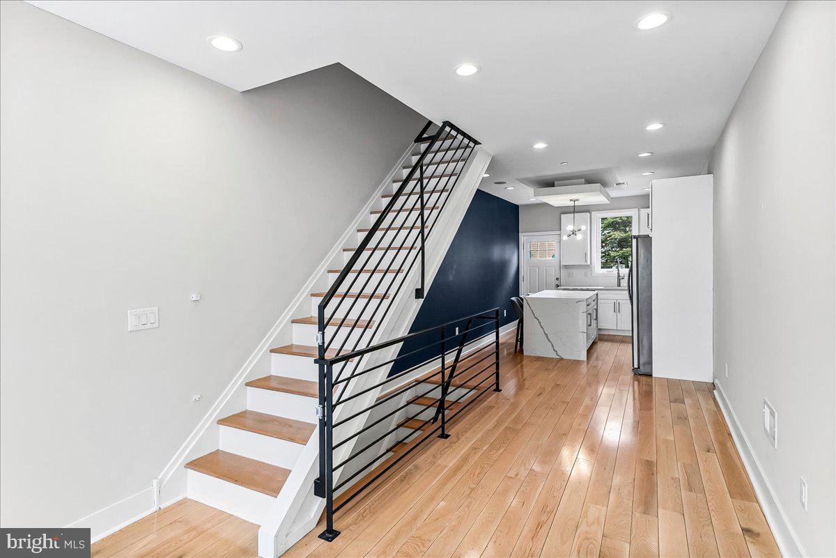 2615 East Letterly Street Philadelphia, PA 19125 - Photo 7 of 36 a view of entryway and hall with wooden floor