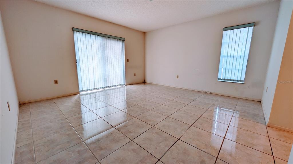 11438 Palomar Street Spring Hill, FL 34609 - Photo 25 of 37 a view of an empty room and window