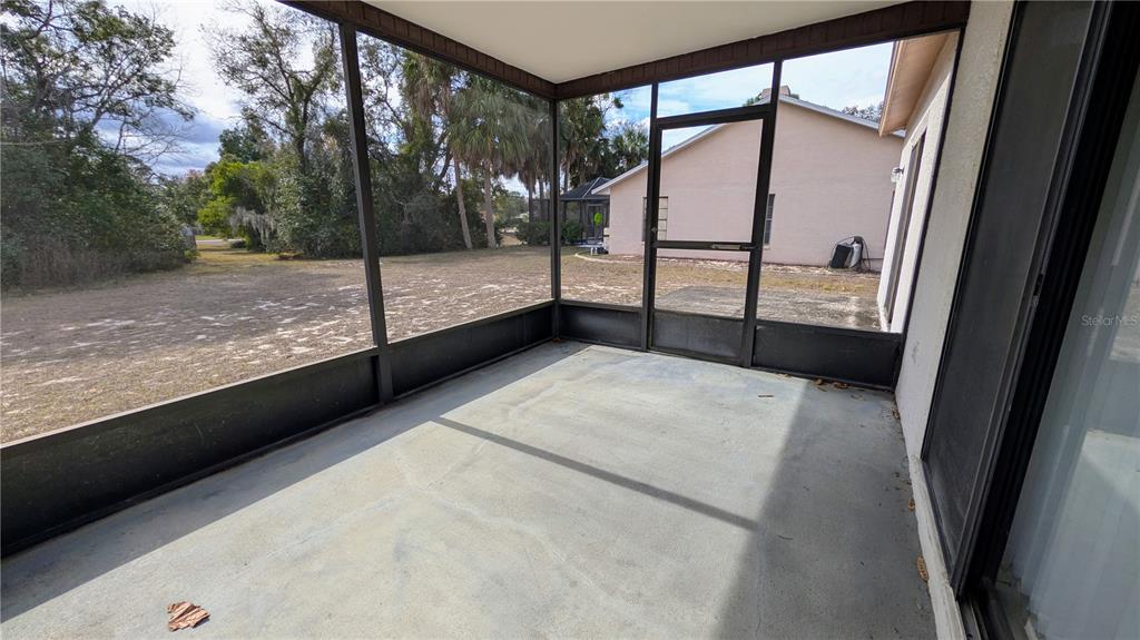 11438 Palomar Street Spring Hill, FL 34609 - Photo 32 of 37 a view of a porch