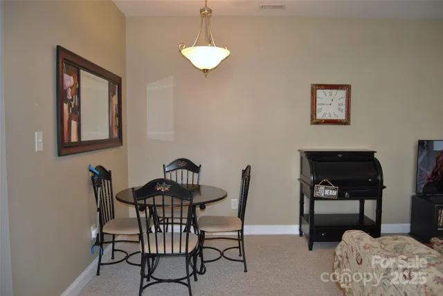 a view of a livingroom with furniture