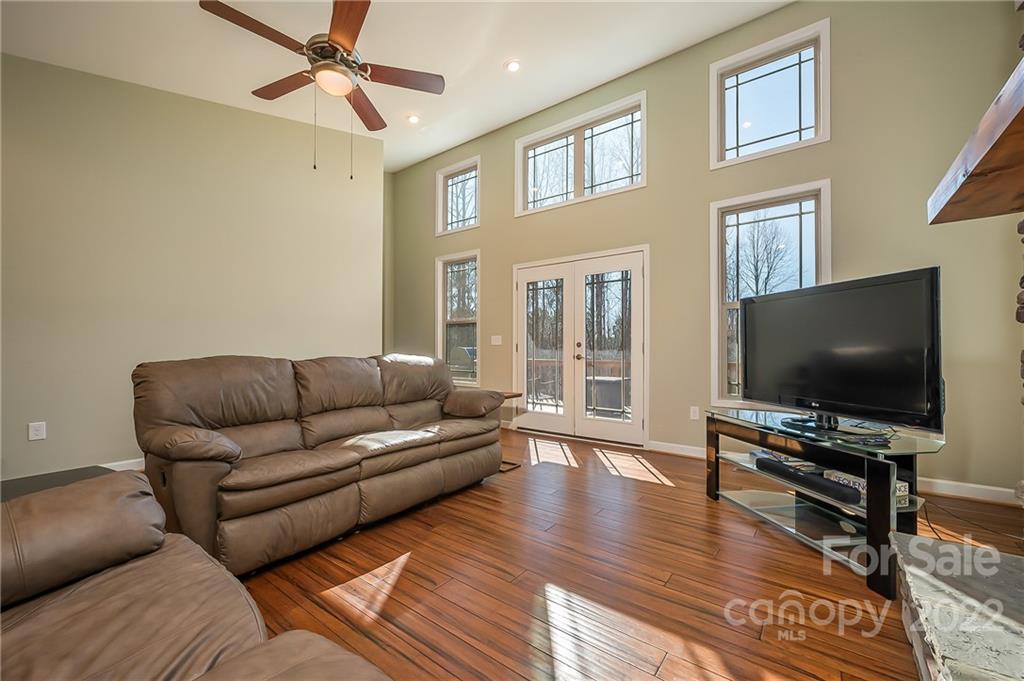 103 Christopher Road Tryon, NC 28782 - Photo 11 of 45 a living room with furniture and a flat screen tv