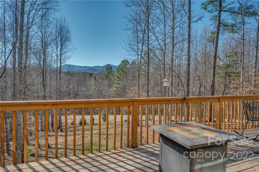 103 Christopher Road Tryon, NC 28782 - Photo 12 of 45 a view of a roof deck with wooden floor and fence
