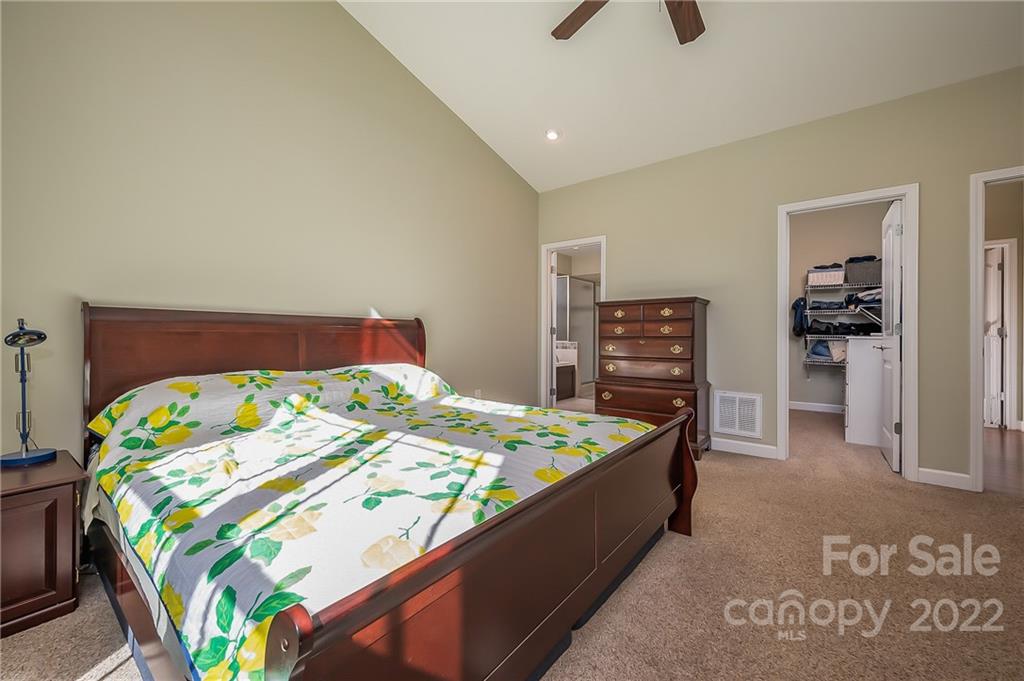 103 Christopher Road Tryon, NC 28782 - Photo 19 of 45 a bedroom with a bed and a dresser