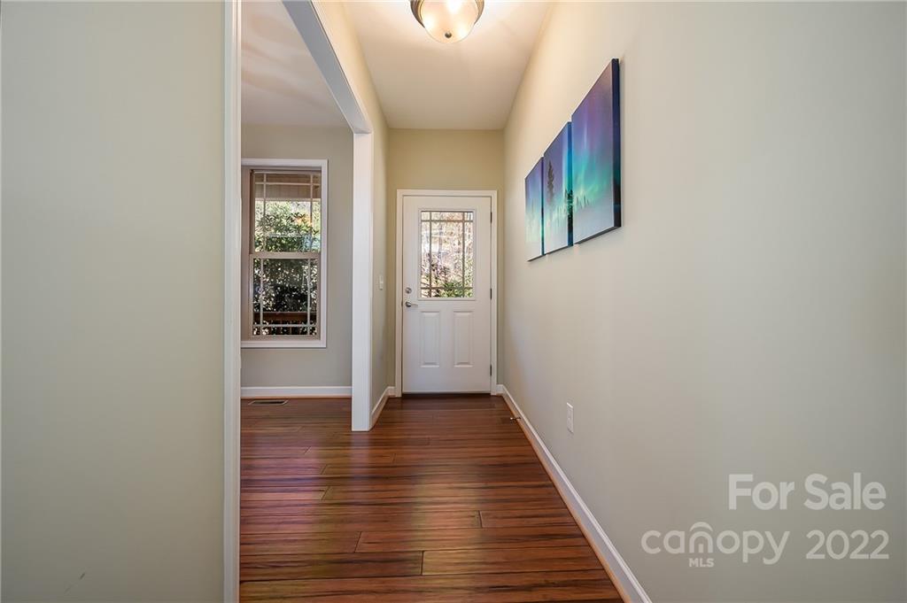 103 Christopher Road Tryon, NC 28782 - Photo 27 of 45 a view of an entryway with wooden floor