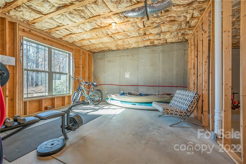 103 Christopher Road Tryon, NC 28782 - Photo 32 of 45 a room with furniture and a window