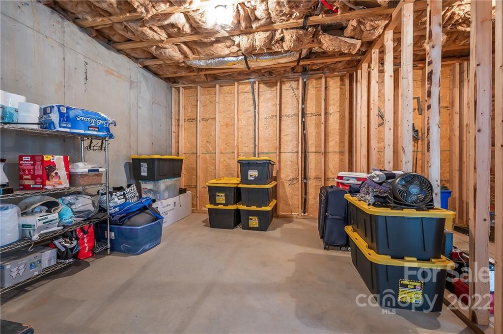 103 Christopher Road Tryon, NC 28782 - Photo 35 of 45 a view of a room with lots of stuff and a car parked in it