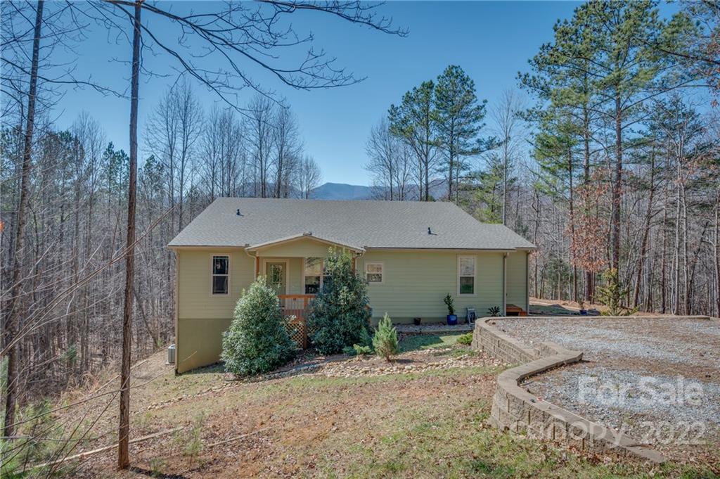 103 Christopher Road Tryon, NC 28782 - Photo 40 of 45 a view of a house with a outdoor space