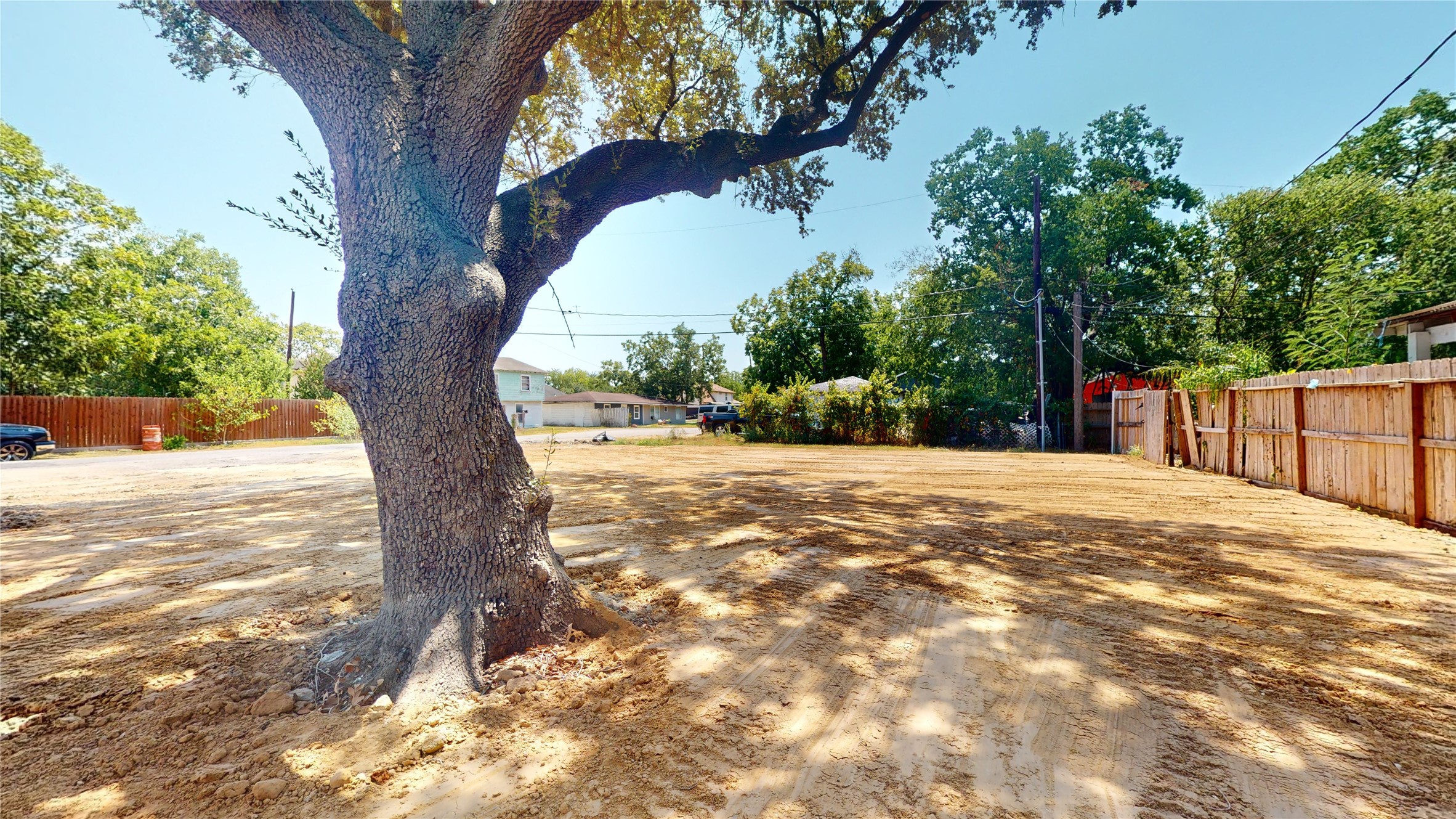 302 Georgia Street, Unit AB South Houston, TX 77587 - Photo 22 of 25 a view of a yard with a tree