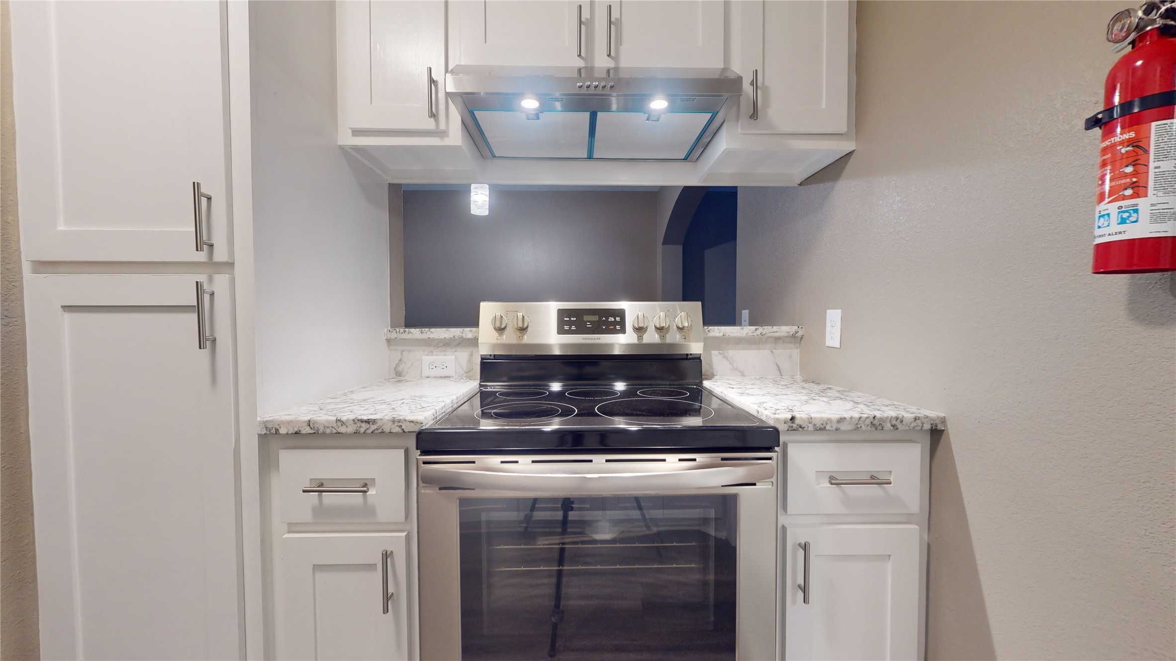 302 Georgia Street, Unit AB South Houston, TX 77587 - Photo 9 of 25 a kitchen with granite countertop a stove and a sink