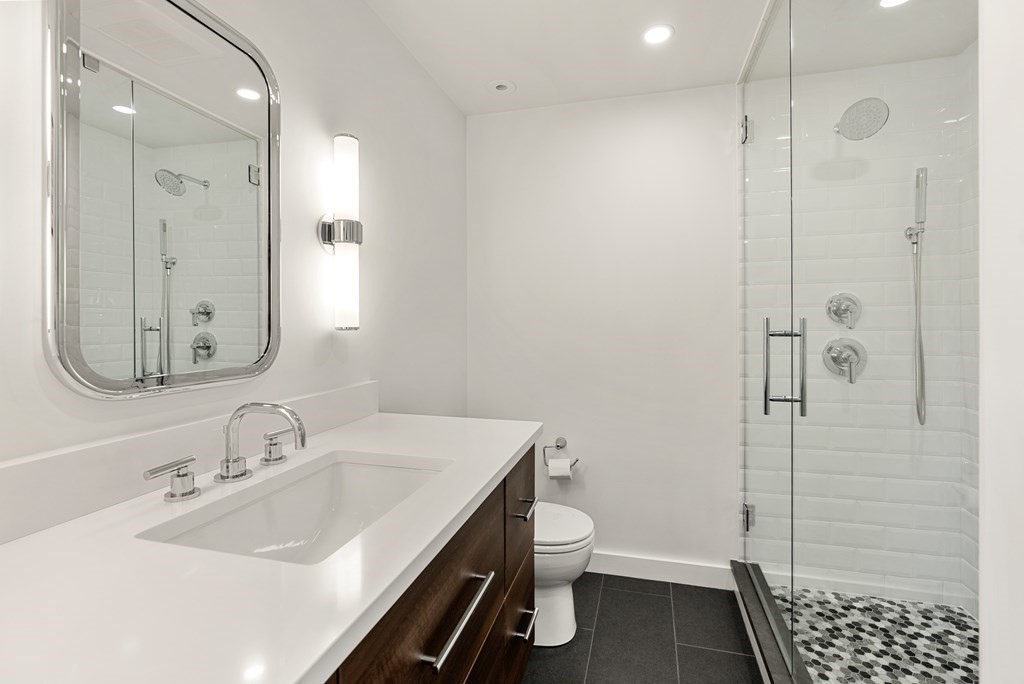 29 Louise Road Belmont, MA 02478 - Photo 13 of 17 a bathroom with a sink a toilet and shower