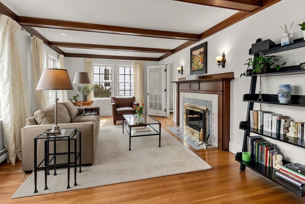 29 Louise Road Belmont, MA 02478 - Photo 2 of 17 a living room with furniture and a fireplace