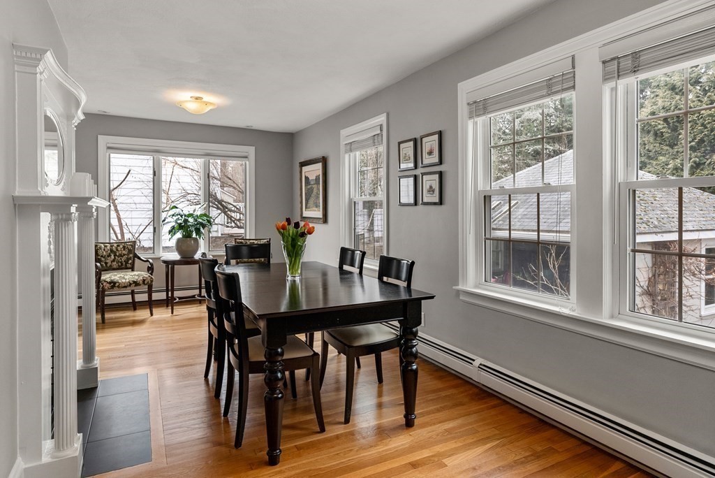29 Louise Road Belmont, MA 02478 - Photo 5 of 17 a view of a dining room with furniture window and wooden floor