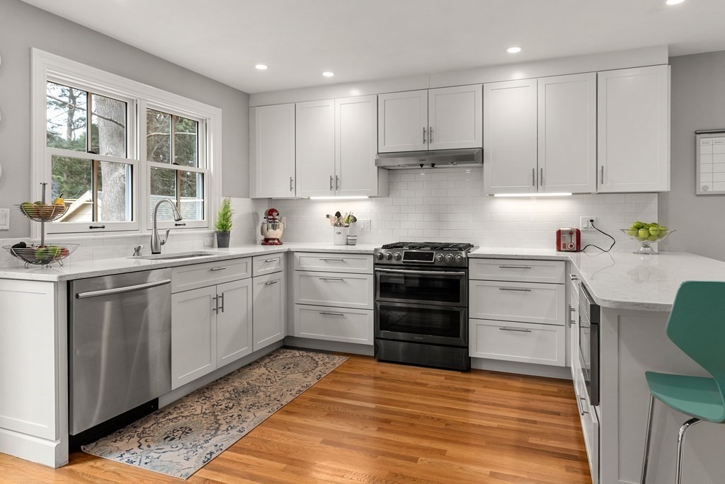 29 Louise Road Belmont, MA 02478 - Photo 8 of 17 a kitchen with a stove sink and a refrigerator