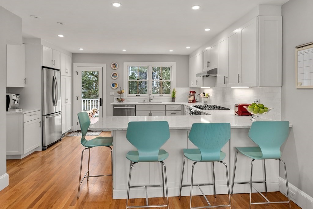 29 Louise Road Belmont, MA 02478 - Photo 9 of 17 a dining room with furniture and a wooden floor