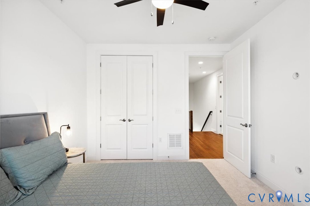 1722 Old Brick Road, Unit A Henrico, VA 23233 - Photo 25 of 41 Bedroom featuring light carpet, a closet, and a ce