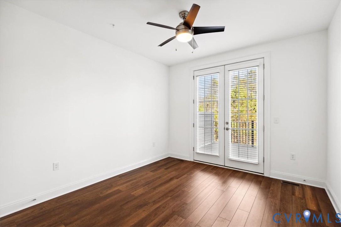 1722 Old Brick Road, Unit A Henrico, VA 23233 - Photo 29 of 41 Spare room with dark wood-type flooring, ceiling f