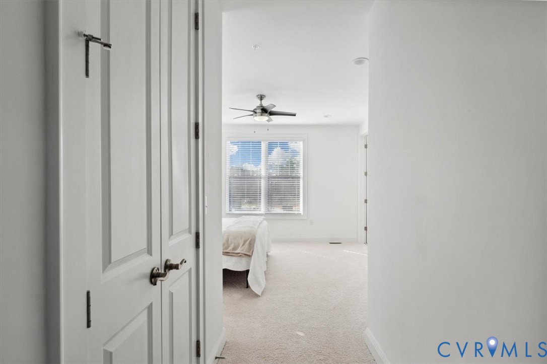 1722 Old Brick Road, Unit A Henrico, VA 23233 - Photo 33 of 41 Corridor featuring light colored carpet and basebo
