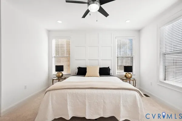 a bedroom with a bed and a view of bathroom