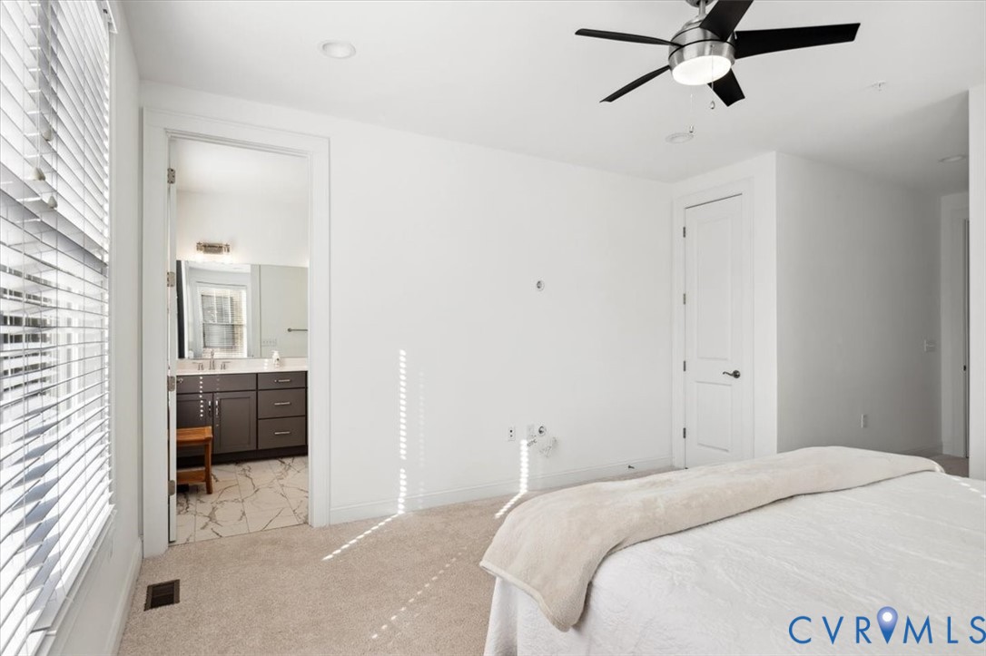 1722 Old Brick Road, Unit A Henrico, VA 23233 - Photo 38 of 41 Bedroom with light carpet, a ceiling fan, and ensu