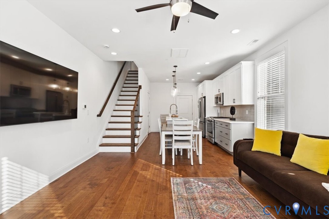 1722 Old Brick Road, Unit A Henrico, VA 23233 - Photo 7 of 41 Living room featuring stairway, dark wood-style fl
