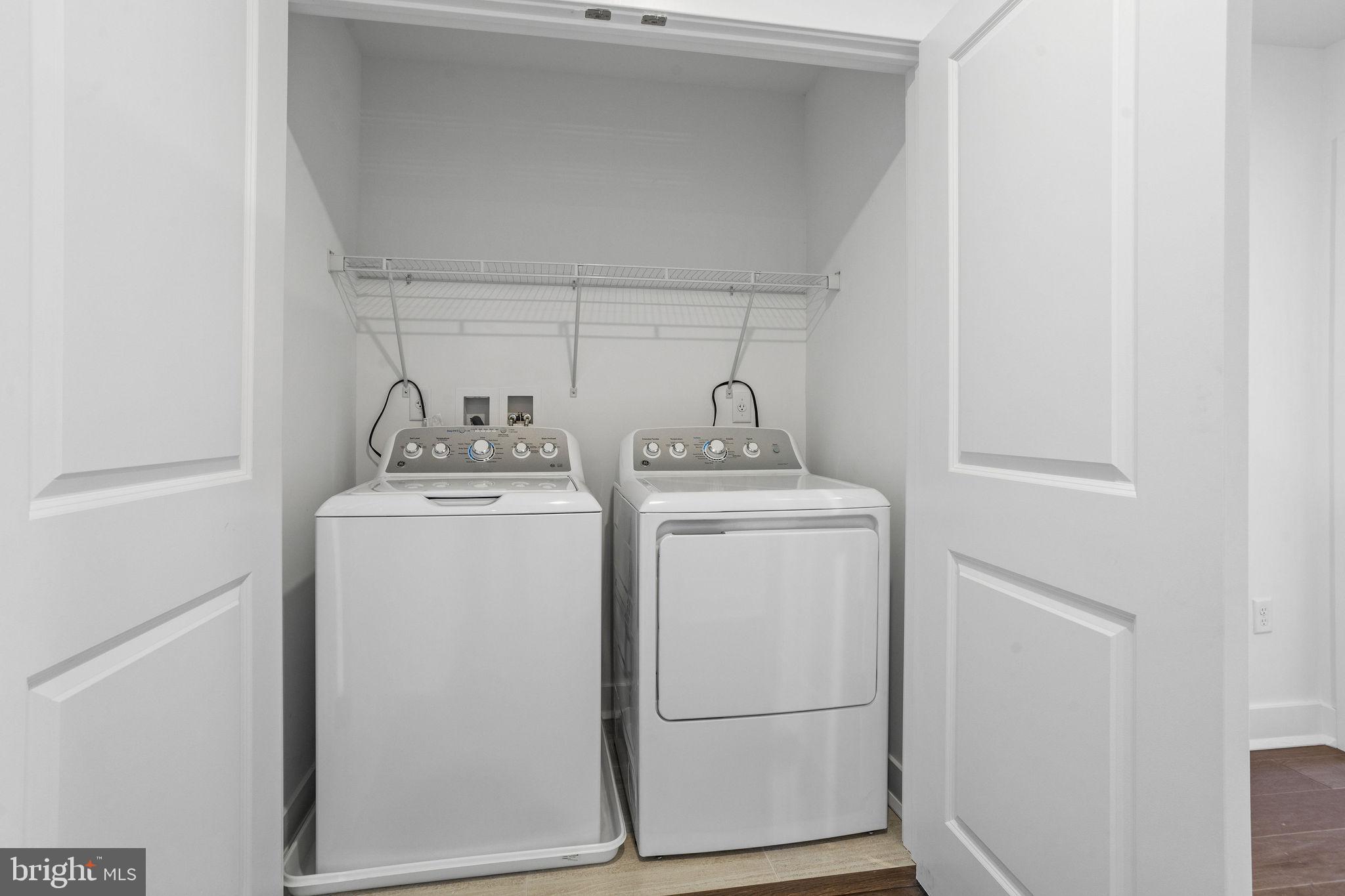 142 ADA Hightower Avenue Pennington, NJ 08534 - Photo 19 of 46 a utility room with dryer and washer