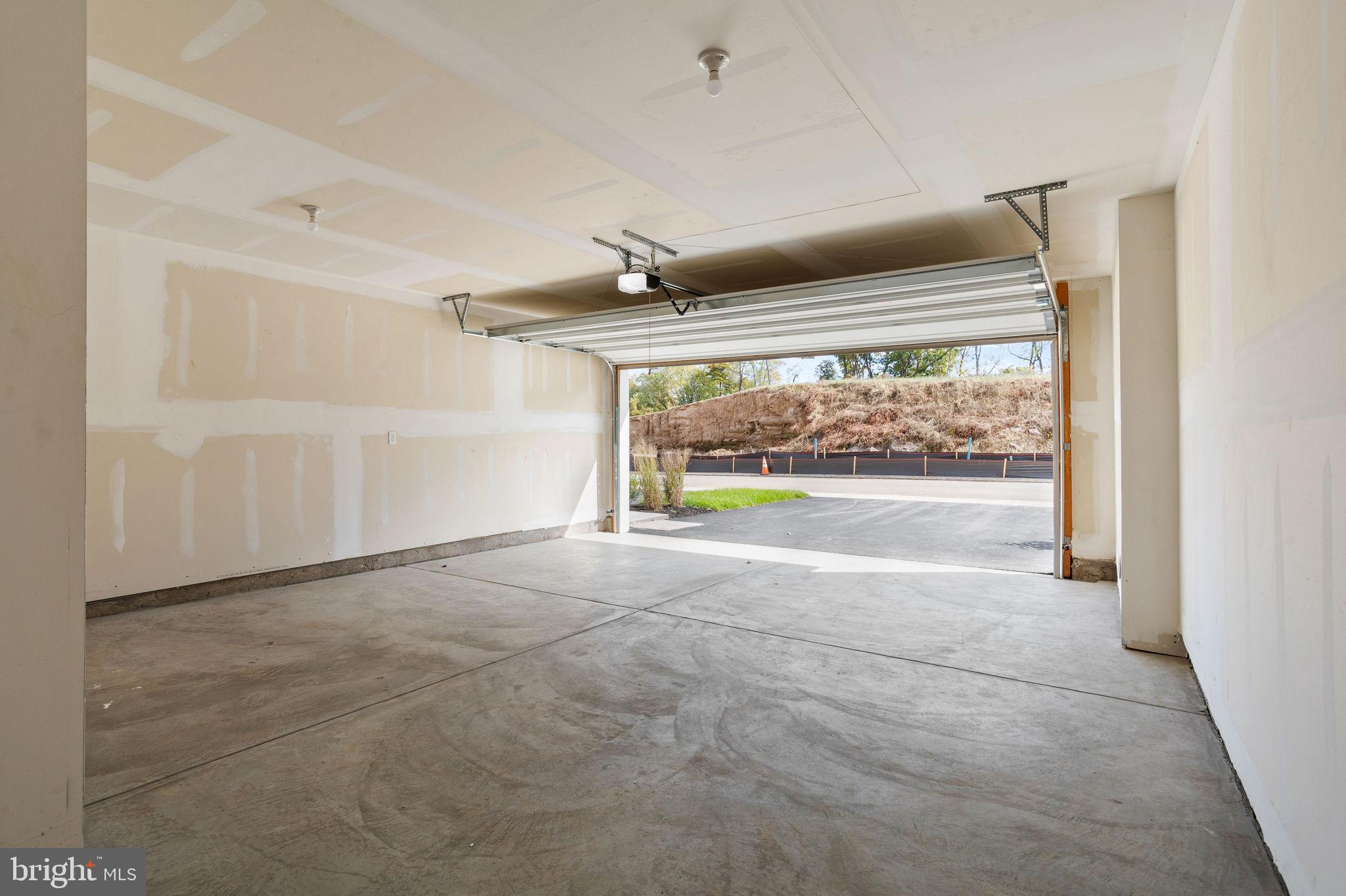 142 ADA Hightower Avenue Pennington, NJ 08534 - Photo 2 of 46 a view of an empty room with a window