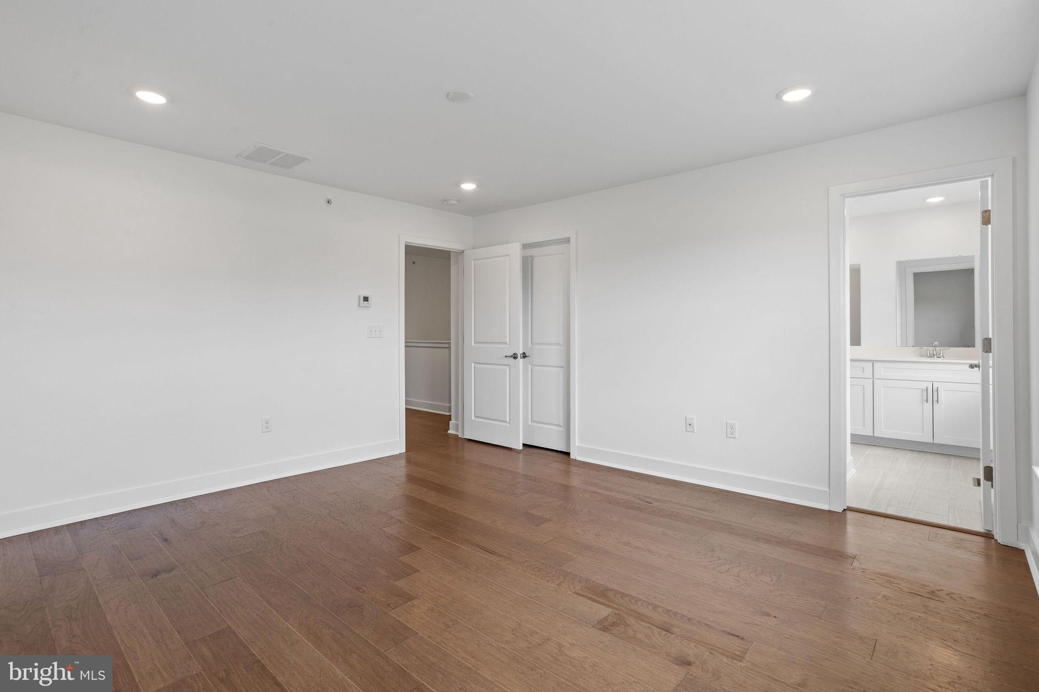 142 ADA Hightower Avenue Pennington, NJ 08534 - Photo 22 of 46 wooden floor in an empty room