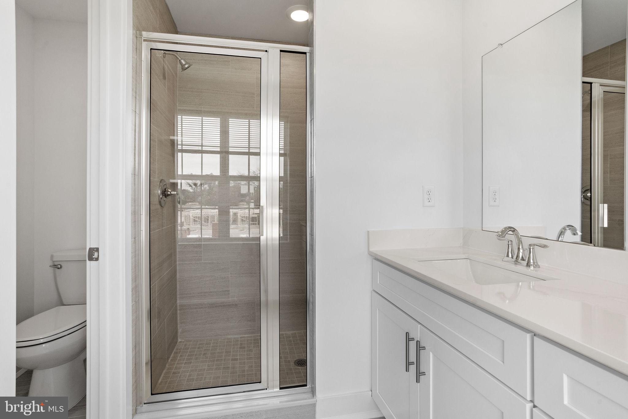 142 ADA Hightower Avenue Pennington, NJ 08534 - Photo 24 of 46 a bathroom with a granite countertop sink toilet and shower