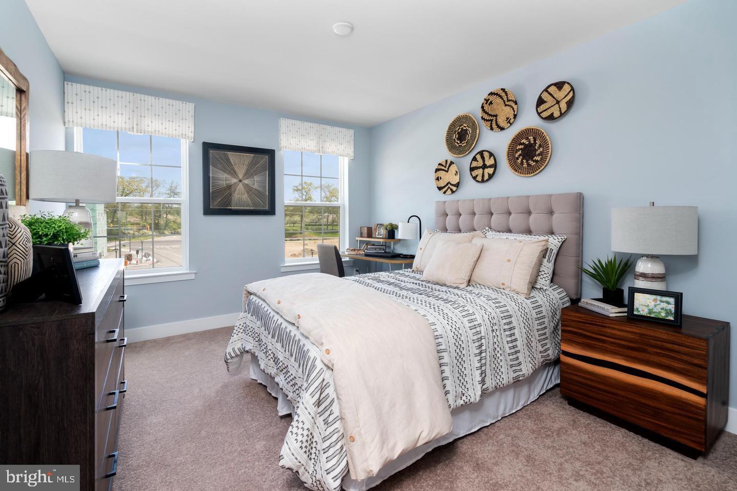 142 ADA Hightower Avenue Pennington, NJ 08534 - Photo 27 of 46 a bedroom with a bed and a window