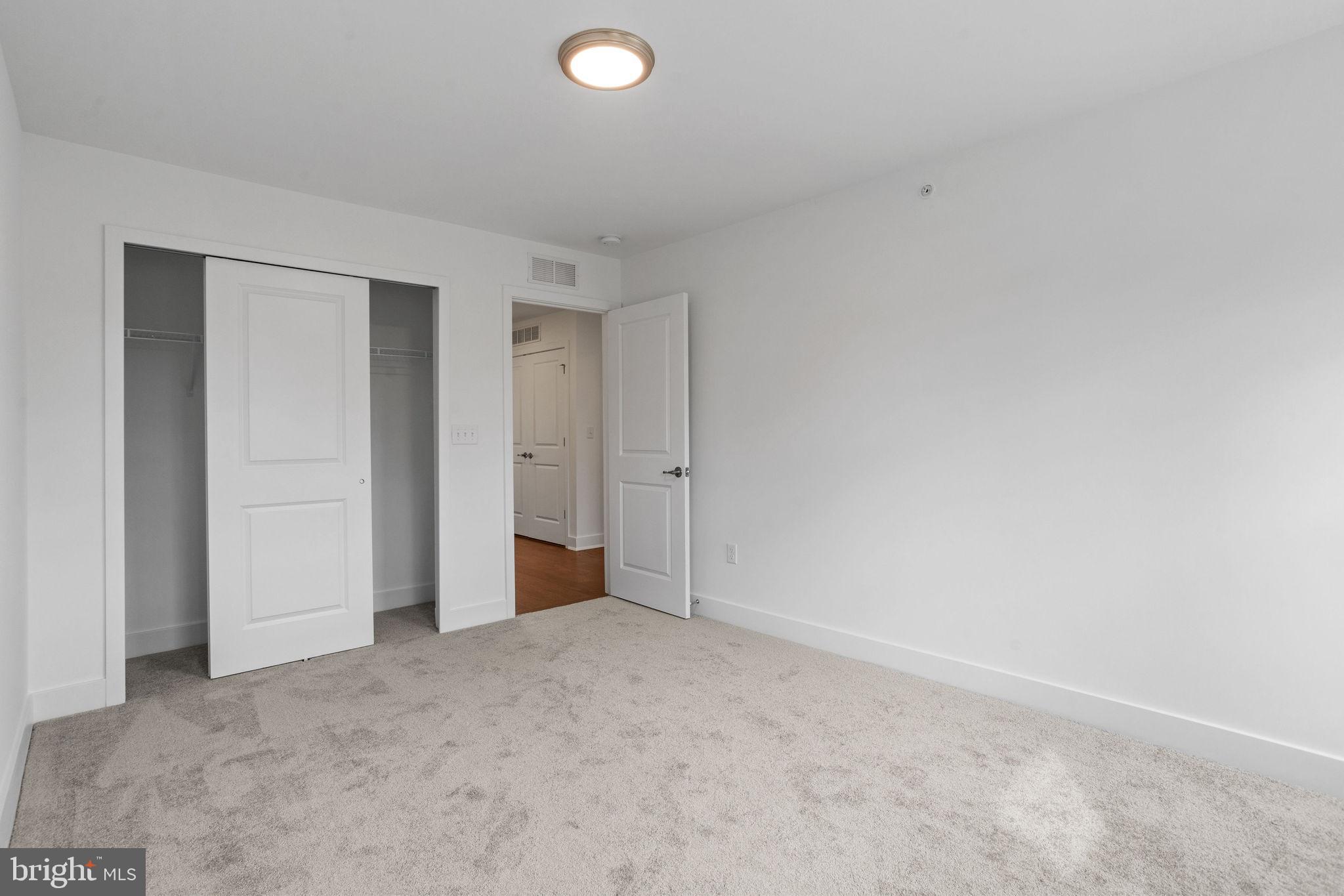 142 ADA Hightower Avenue Pennington, NJ 08534 - Photo 29 of 46 an empty room with closet area
