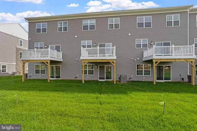 a view of building with yard