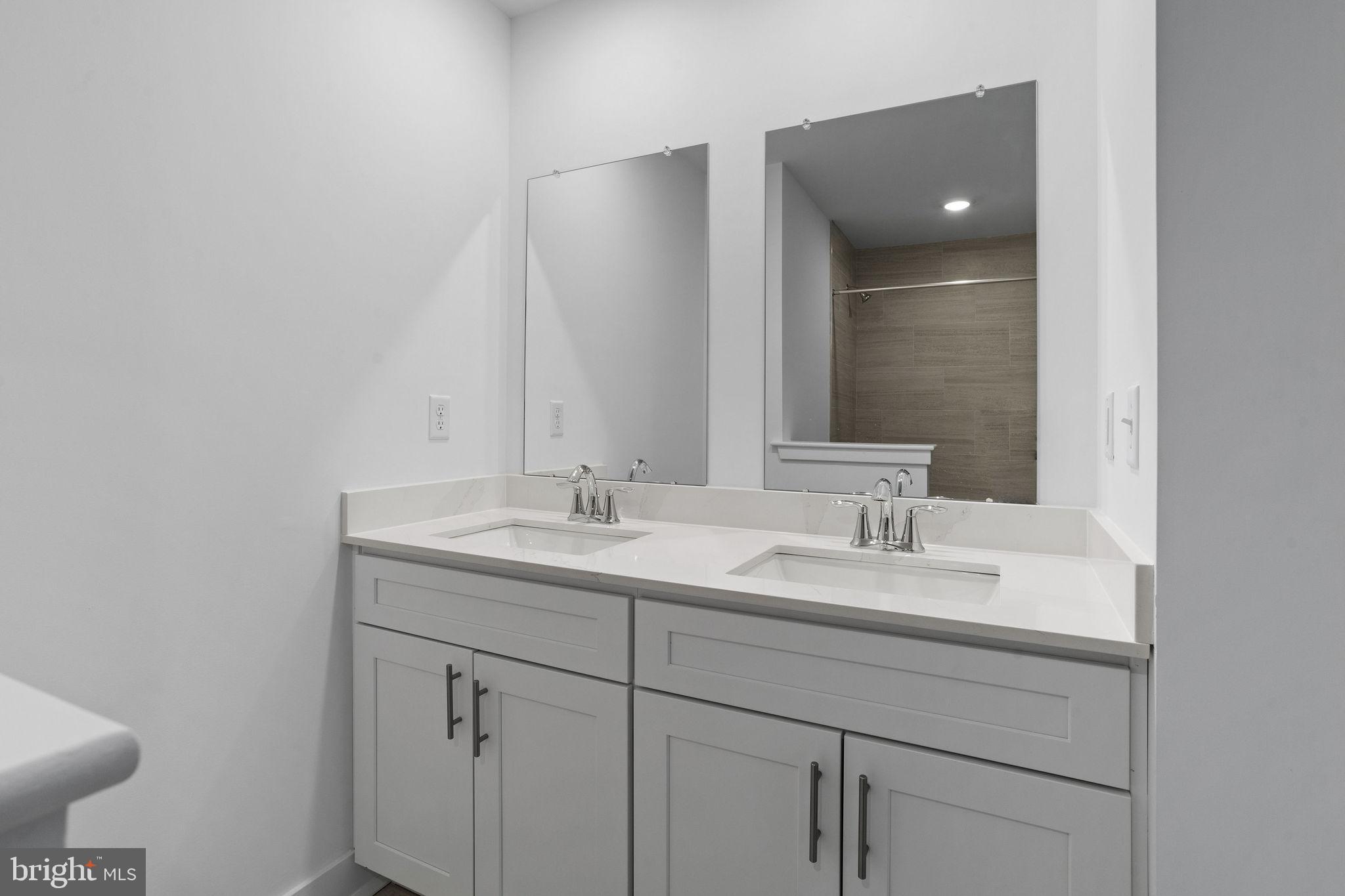 142 ADA Hightower Avenue Pennington, NJ 08534 - Photo 31 of 46 a bathroom with a sink and a toilet