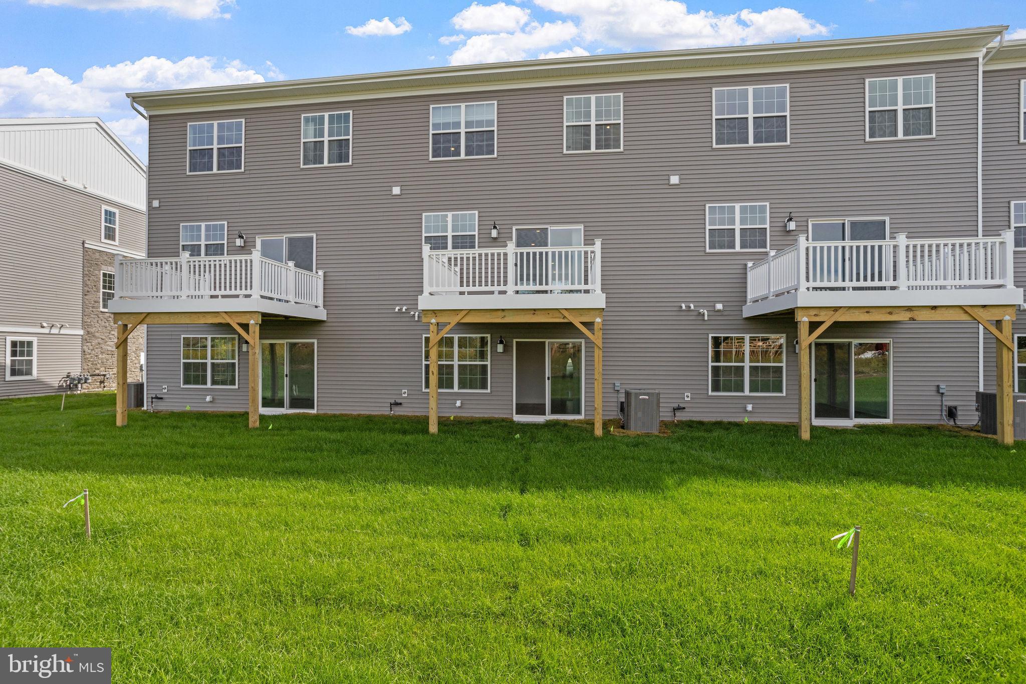 142 ADA Hightower Avenue Pennington, NJ 08534 - Photo 42 of 46 a view of building with yard