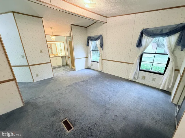 a bathroom with a tub and shower