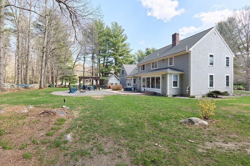 58 Buttercup Lane Hanover, MA 02339 - Photo 32 of 35 a view of a house with backyard and garden