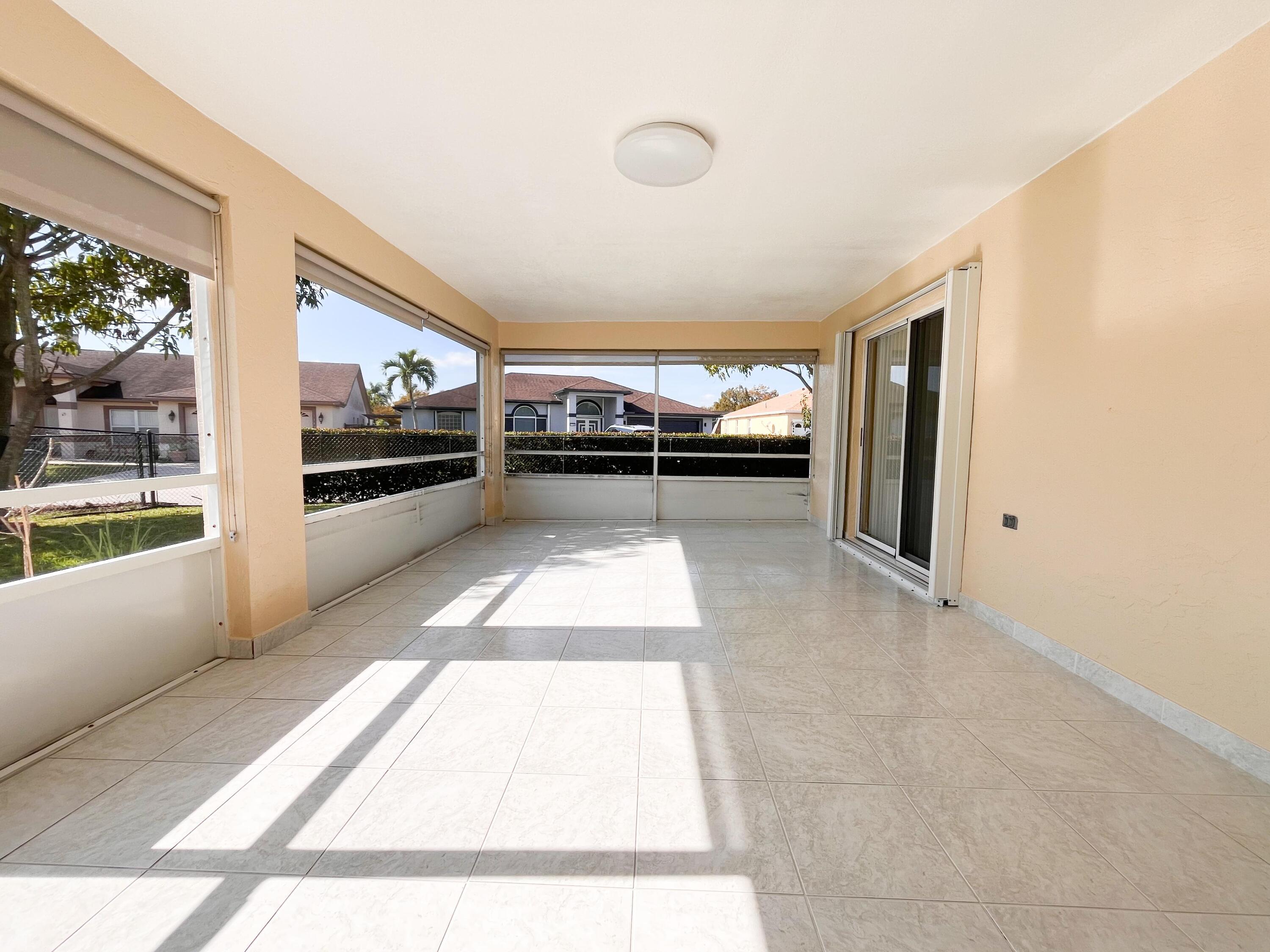 1305 Monteray Way Greenacres, FL 33413 - Photo 24 of 29 a view of a living room with a couch