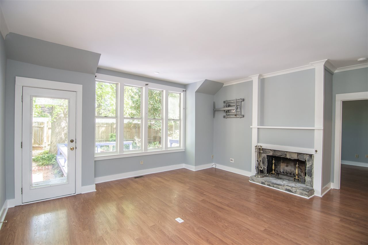 6010 Sentinel Drive Raleigh, NC 27609 - Photo 9 of 30 Living Room wood burning fireplace