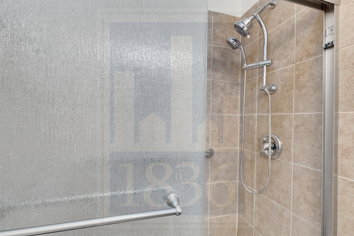 4622 Credo Lane, Unit 167 Austin, TX 78725 - Photo 15 of 25 a bathroom with a shower