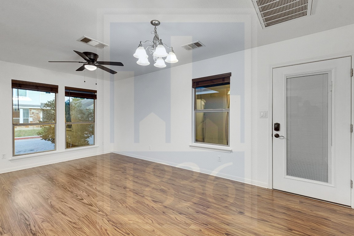 4622 Credo Lane, Unit 167 Austin, TX 78725 - Photo 8 of 25 a view of an empty room with a window
