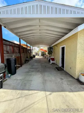 a view of a room with wooden walls
